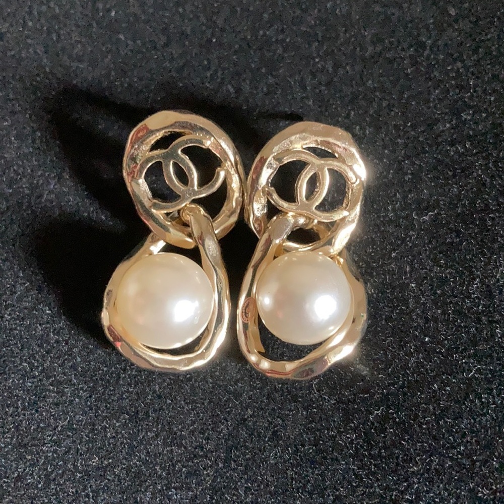 Earrings twisted ellipse with pearl